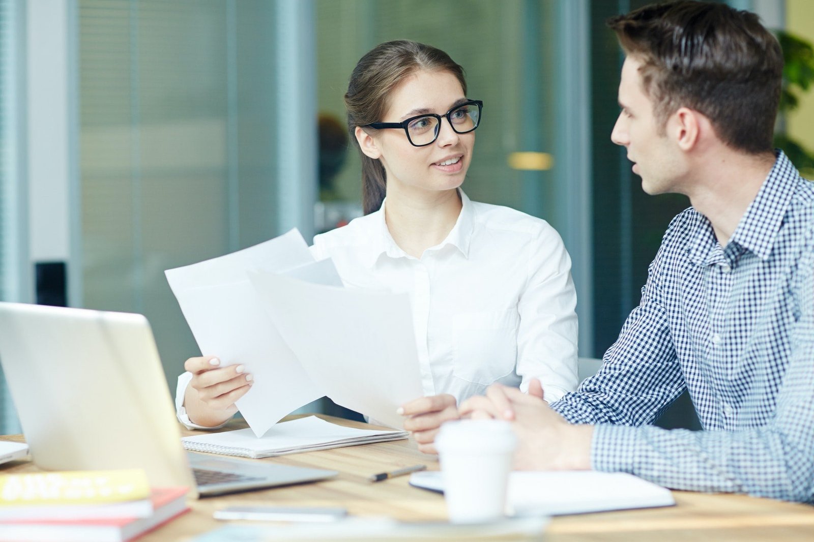 Business owner reviewing VAT filing with consultant in Dubai